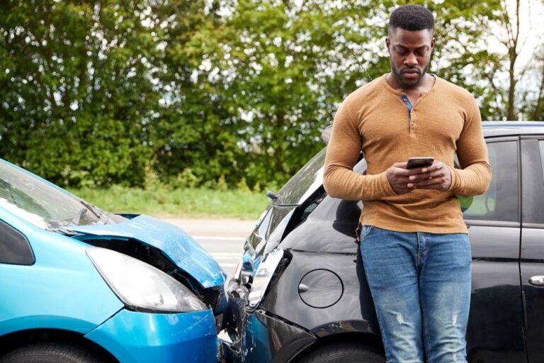 Lexington Car Accident Lawyer - Man Texting after Accident